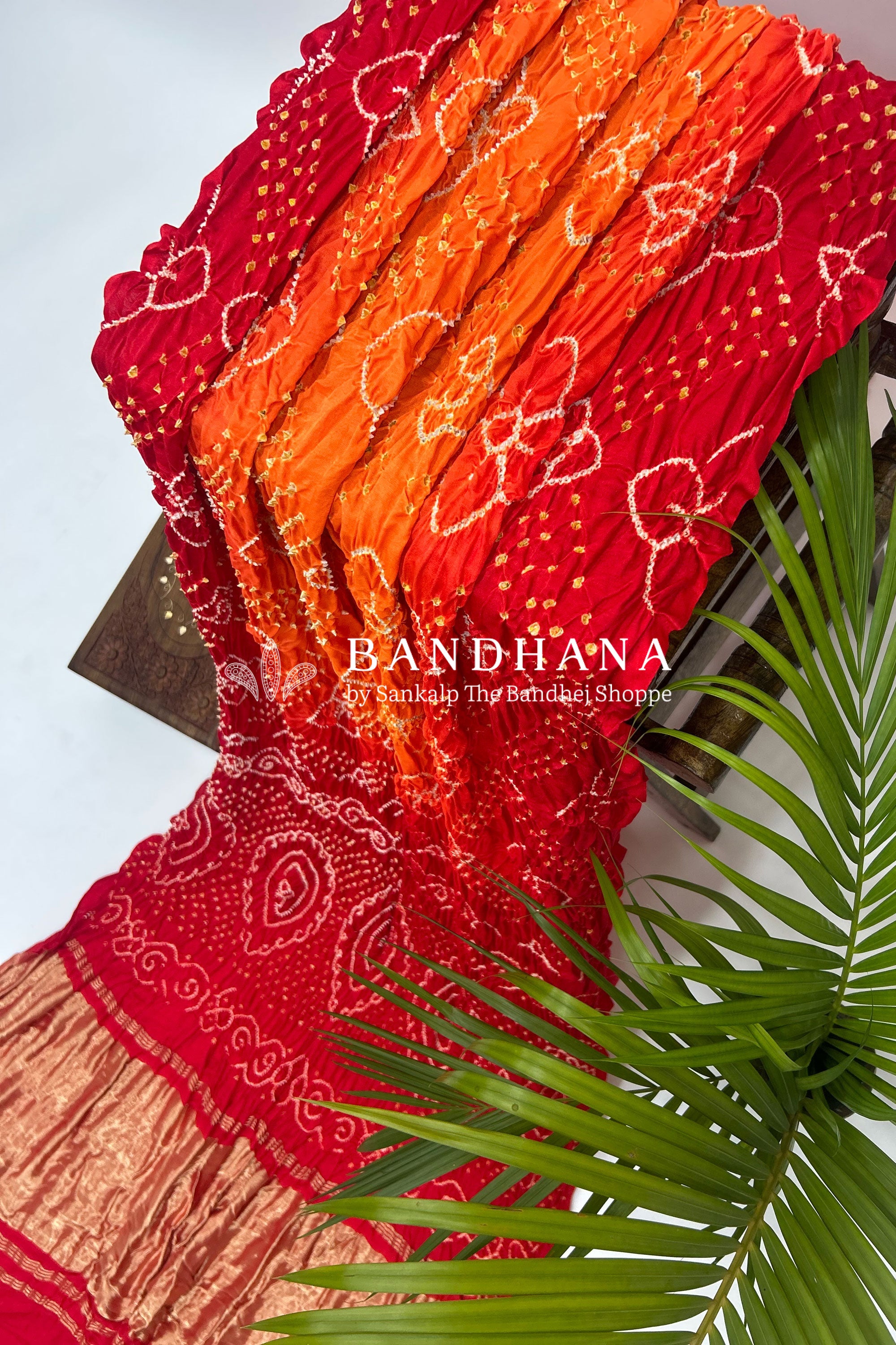 Orange Red Shaded Gajji Fancy Rai Bandhani Saree Sarees